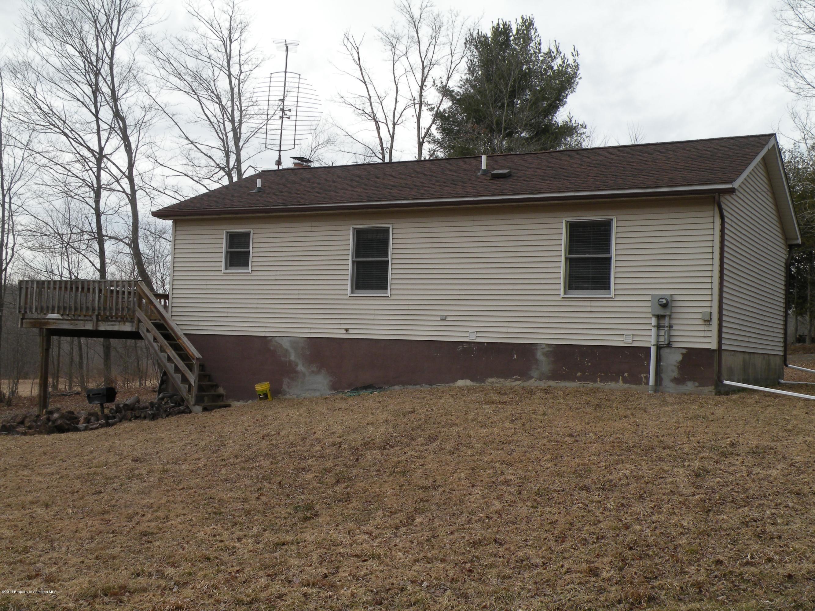 3381 Le Raysville Road Rome, PA 18837 - Photo 4 of 30 a backyard of a house