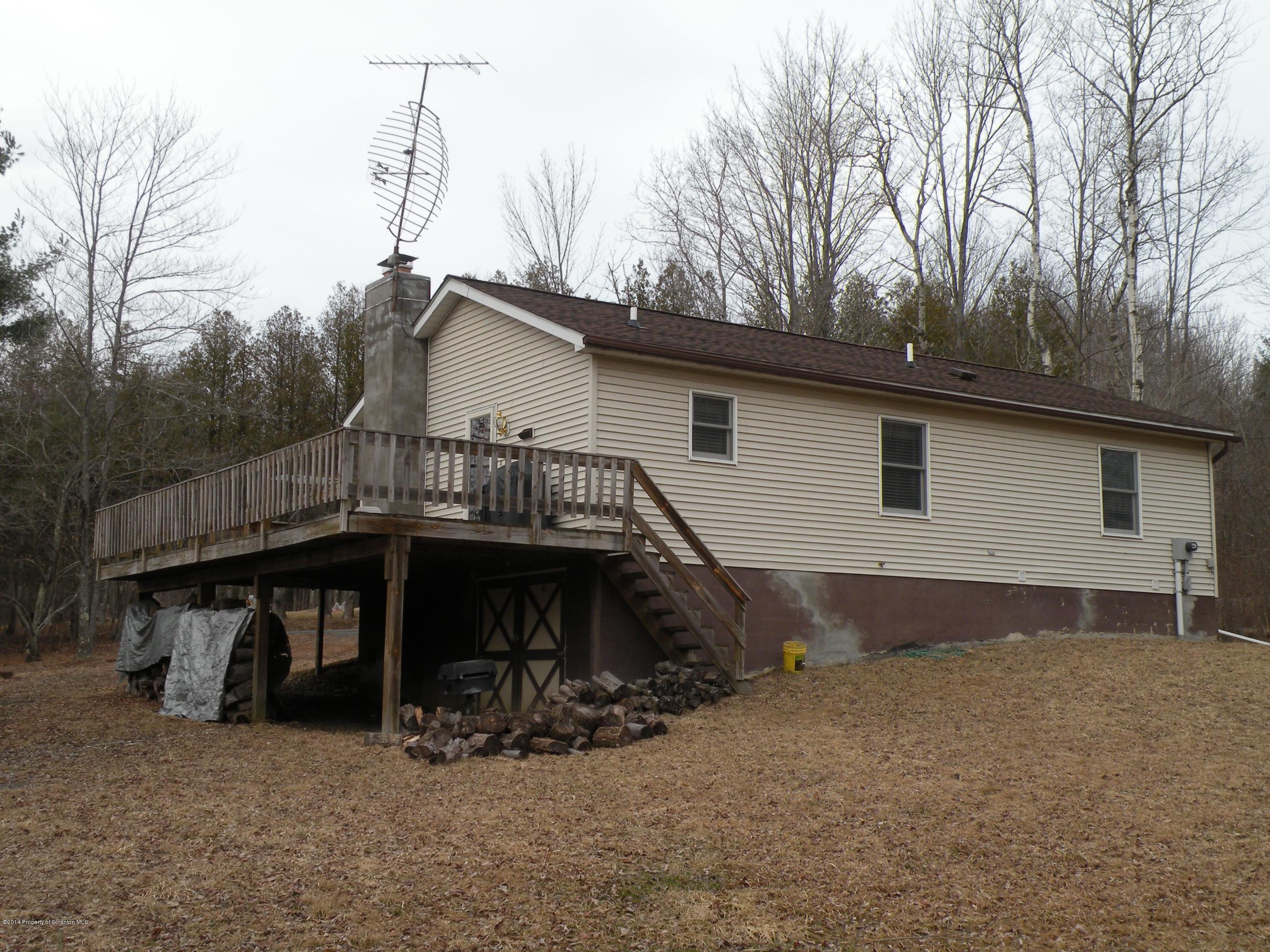 3381 Le Raysville Road Rome, PA 18837 - Photo 5 of 30 a view of a house with a yard and roof deck