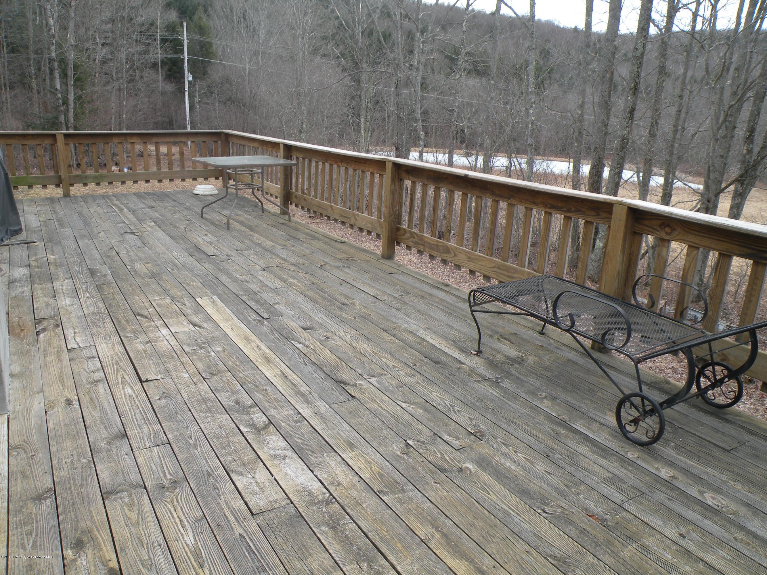 3381 Le Raysville Road Rome, PA 18837 - Photo 6 of 30 a view of balcony with wooden floor and fence
