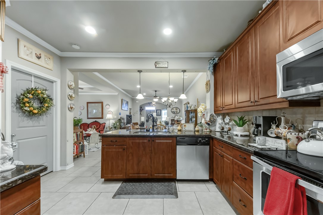 3815 Harvey Road College Station, TX 77845 - Photo 12 of 24 Kitchen with stainless steel appliances, ornamenta