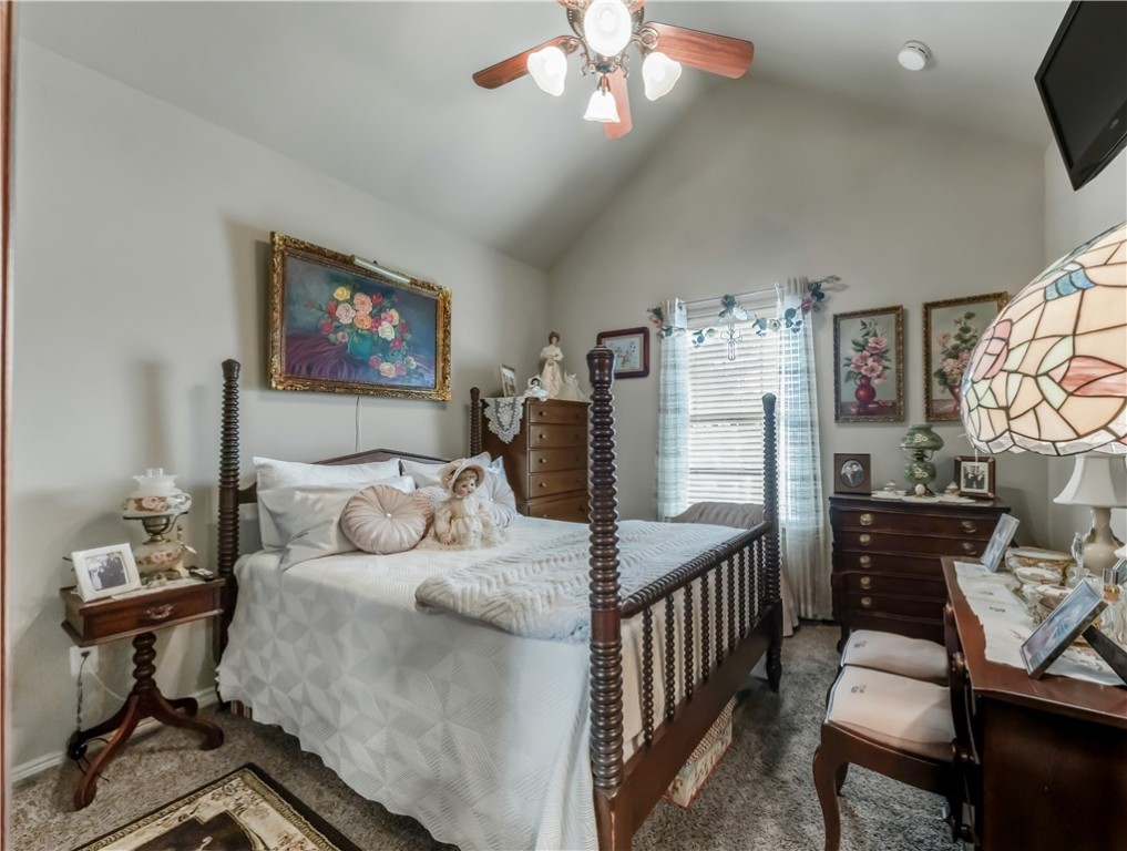 3815 Harvey Road College Station, TX 77845 - Photo 19 of 24 Carpeted bedroom with ceiling fan and high vaulted