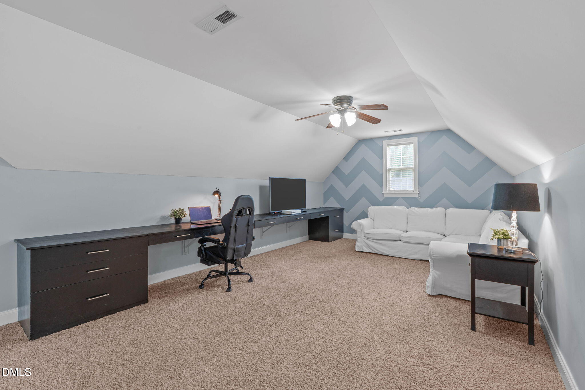 2450 Rolling Tracks Road Willow Spring, NC 27592 - Photo 41 of 64 a view of a workspace with furniture