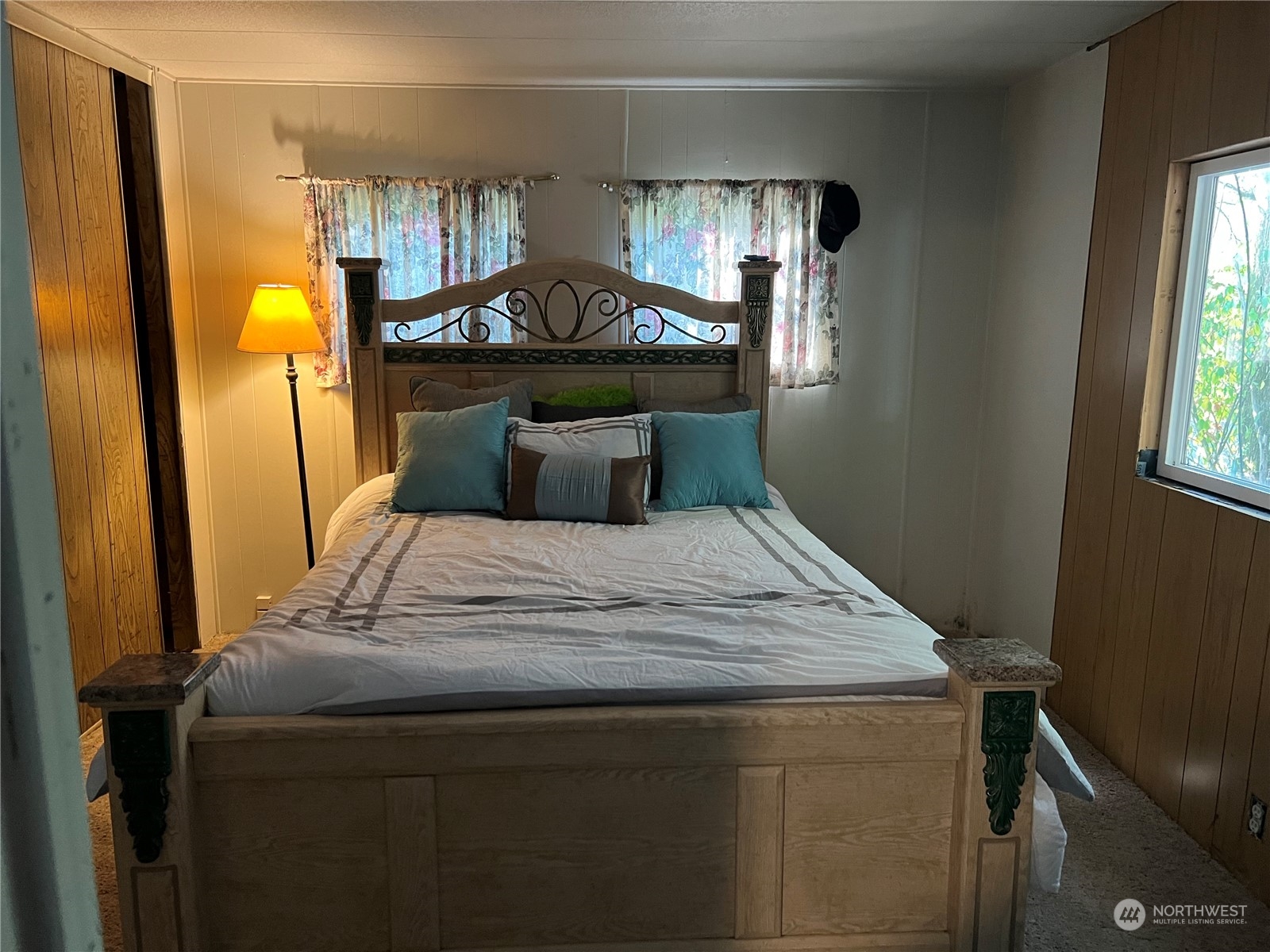 1729 Southeast 194th Street, Unit 32 Bothell, WA 98012 - Photo 16 of 19 a bedroom with a bed and window