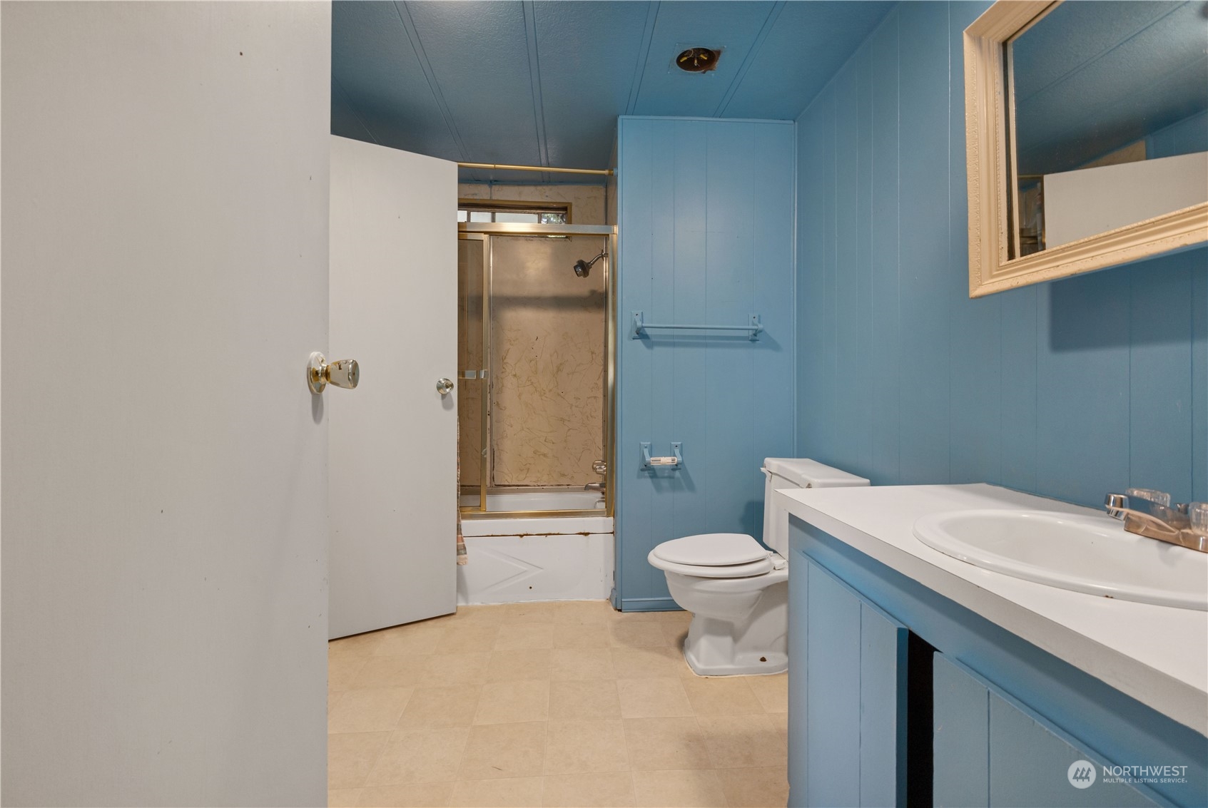 1729 Southeast 194th Street, Unit 32 Bothell, WA 98012 - Photo 19 of 19 a bathroom with a sink a toilet and shower