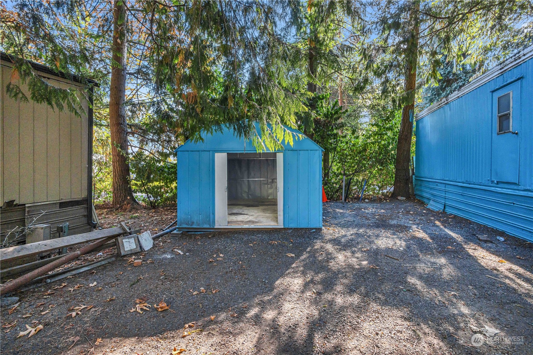 1729 Southeast 194th Street, Unit 32 Bothell, WA 98012 - Photo 4 of 19 a view of a house with a backyard