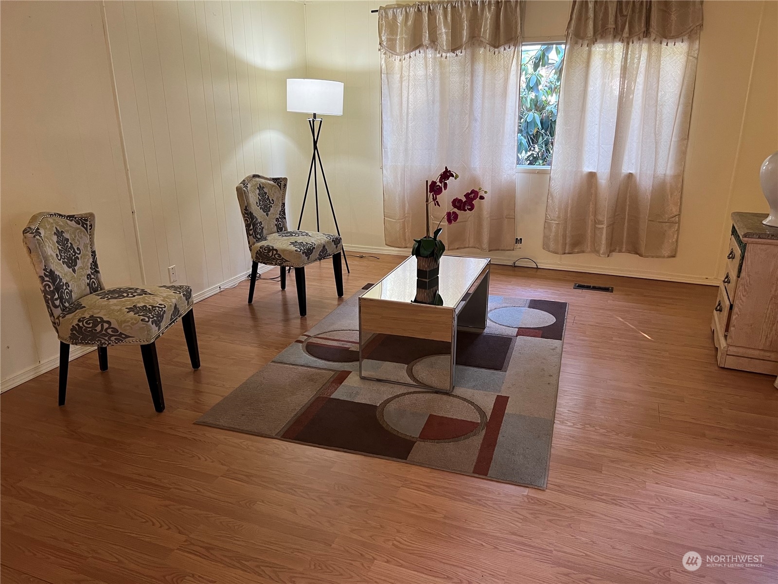 1729 Southeast 194th Street, Unit 32 Bothell, WA 98012 - Photo 9 of 19 a living room with furniture and a wooden floor