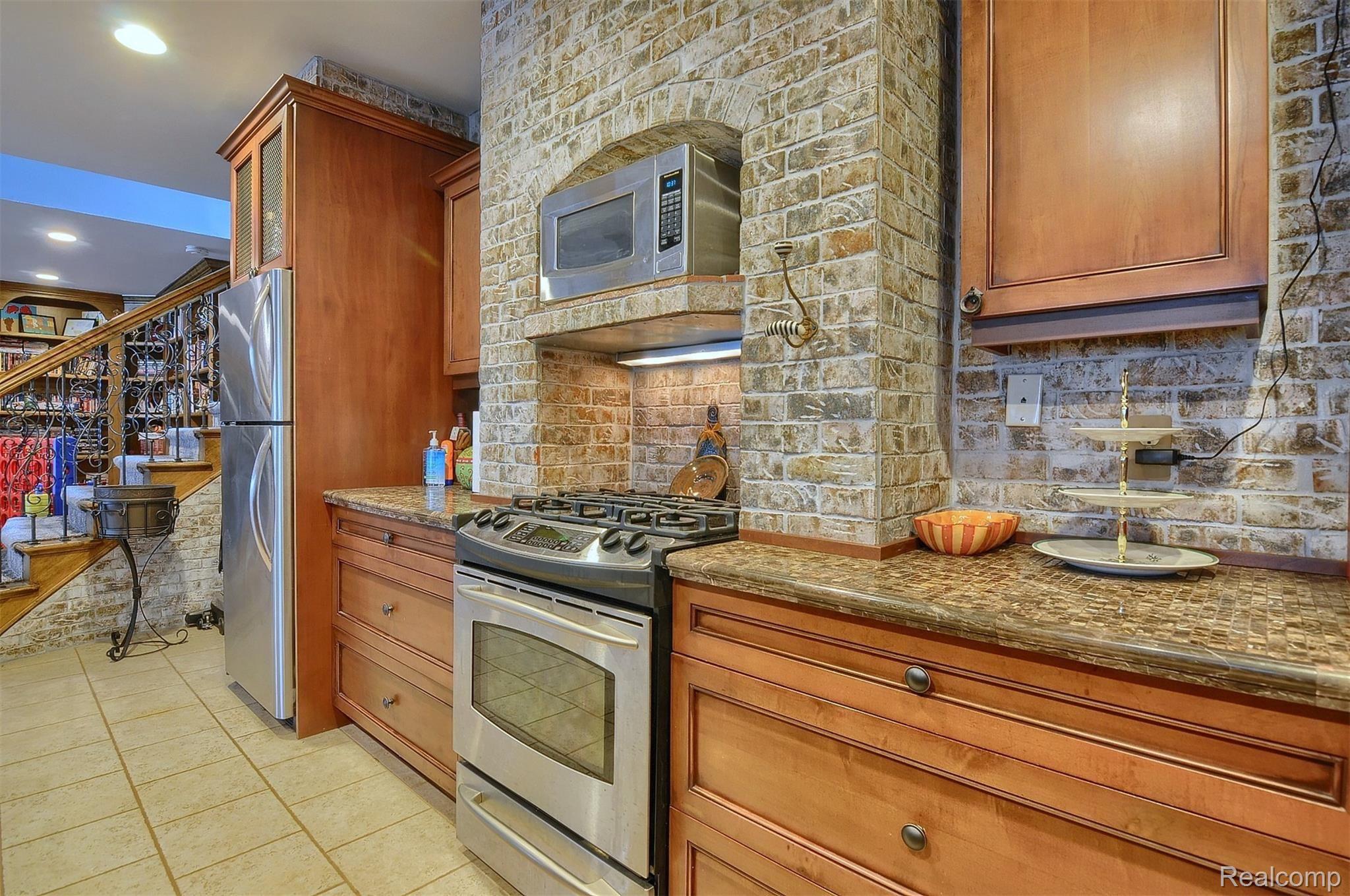 8311 Waumegah Road Clarkston, MI 48348 - Photo 44 of 61 47-Finished-Lower-Level-Kitchen.jpg