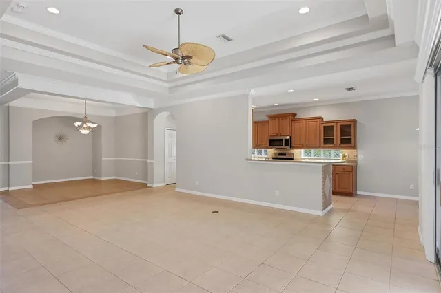 a view of a kitchen with a sink and dishwasher cabinet