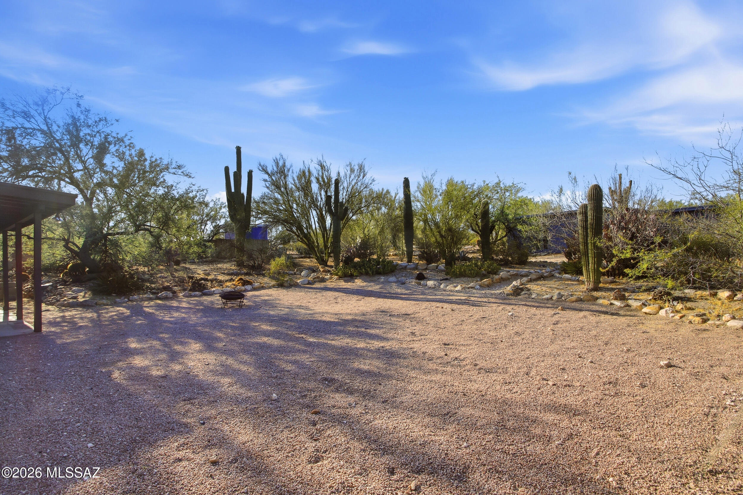 9141 East Indian Canyon Road Tucson, AZ 85749 - Photo 28 of 33 a view of a yard with a tree