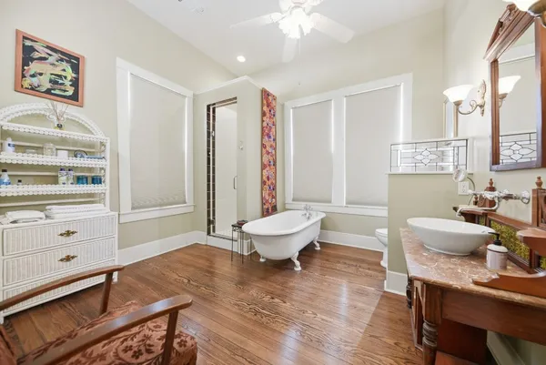 a living room with furniture a table and decor