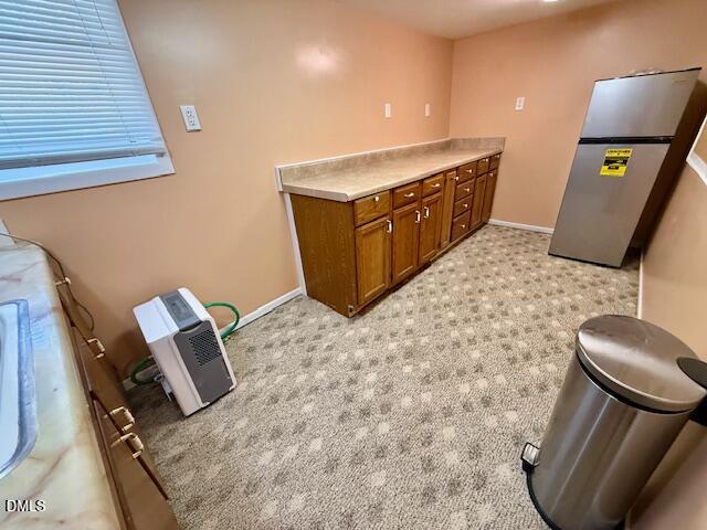 132 Buffalo Road Clarksville, VA 23927 - Photo 39 of 56 a kitchen with a refrigerator and a stove top oven