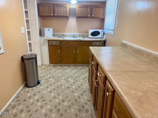132 Buffalo Road Clarksville, VA 23927 - Photo 40 of 56 a kitchen with a stove and a refrigerator
