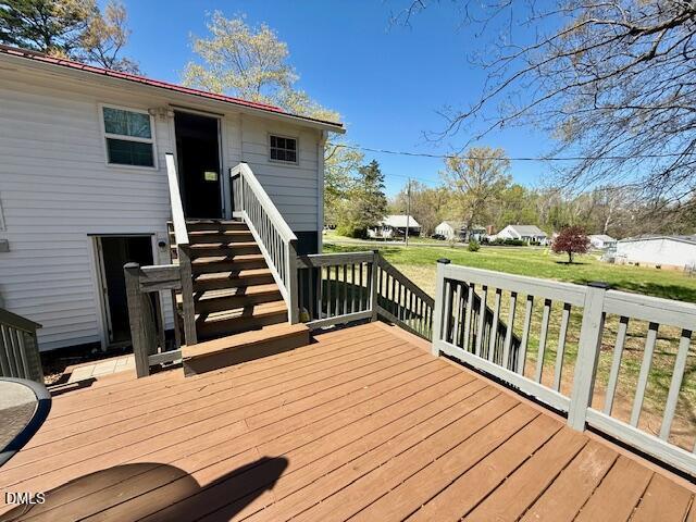 132 Buffalo Road Clarksville, VA 23927 - Photo 44 of 56 a view of deck with wooden floor and outdoor seating
