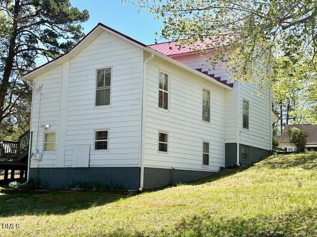 132 Buffalo Road Clarksville, VA 23927 - Photo 51 of 56 a view of a white house with a yard