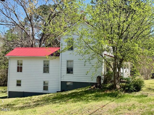 132 Buffalo Road Clarksville, VA 23927 - Photo 54 of 56 a view of a house with a yard