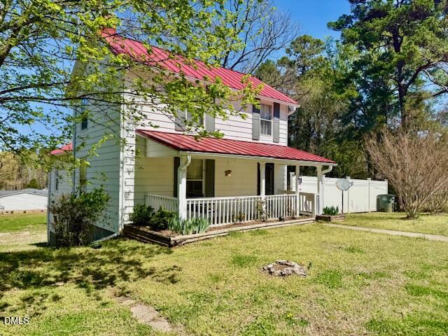 132 Buffalo Road Clarksville, VA 23927 - Photo 55 of 56 a front view of house with yard and green space