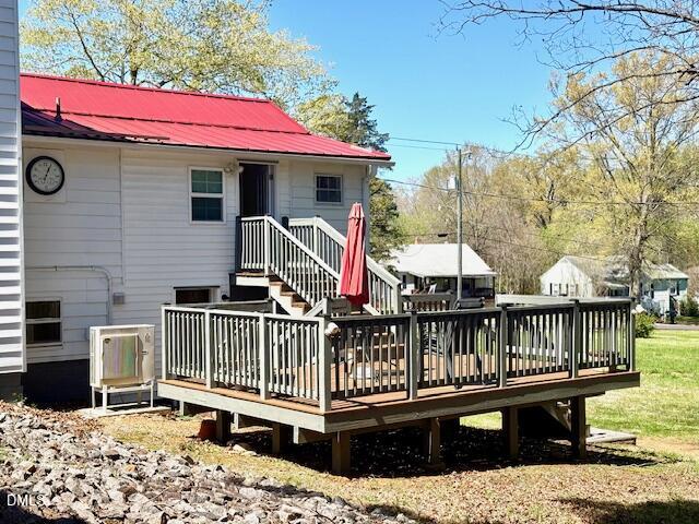 132 Buffalo Road Clarksville, VA 23927 - Photo 9 of 56 a view of a house with wooden deck