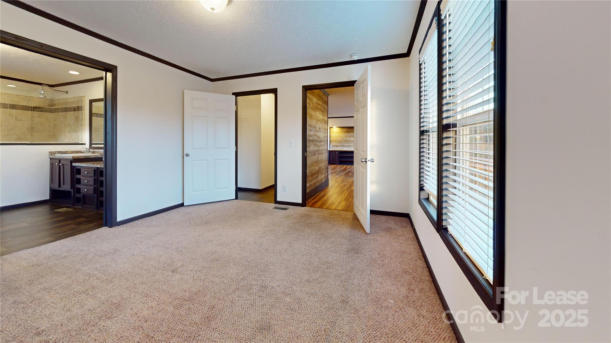 7708 Waxhaw Highway Waxhaw, NC 28173 - Photo 11 of 28 a view of empty room with closet and windows