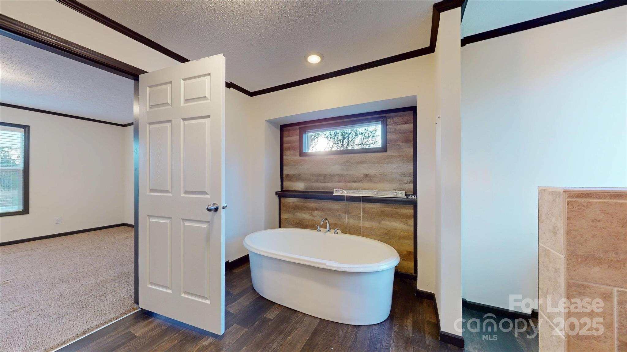 7708 Waxhaw Highway Waxhaw, NC 28173 - Photo 14 of 28 a bathroom with a toilet and a shower