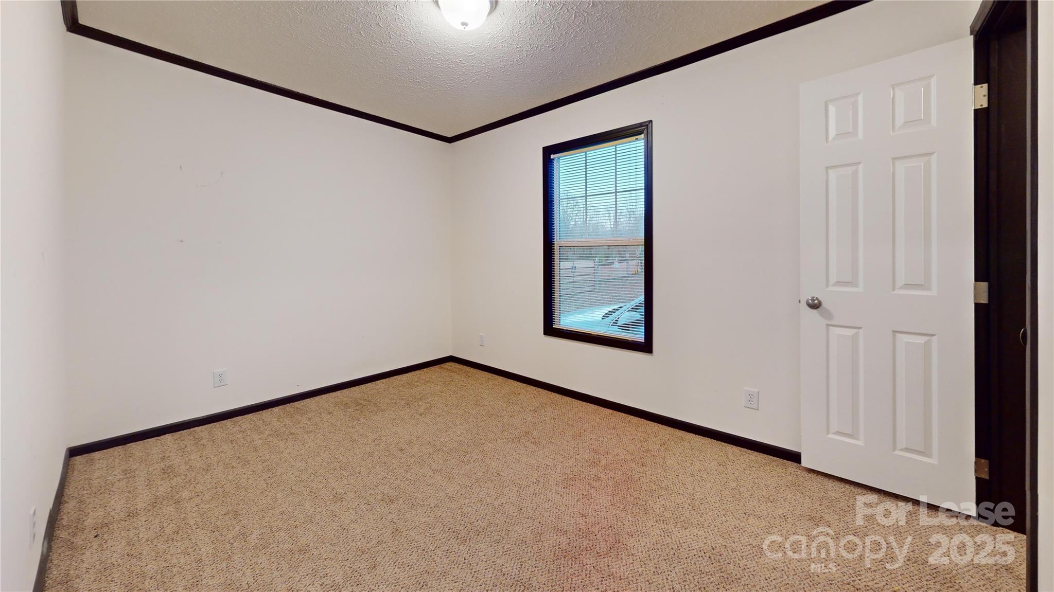 7708 Waxhaw Highway Waxhaw, NC 28173 - Photo 17 of 28 a view of a room with a large window