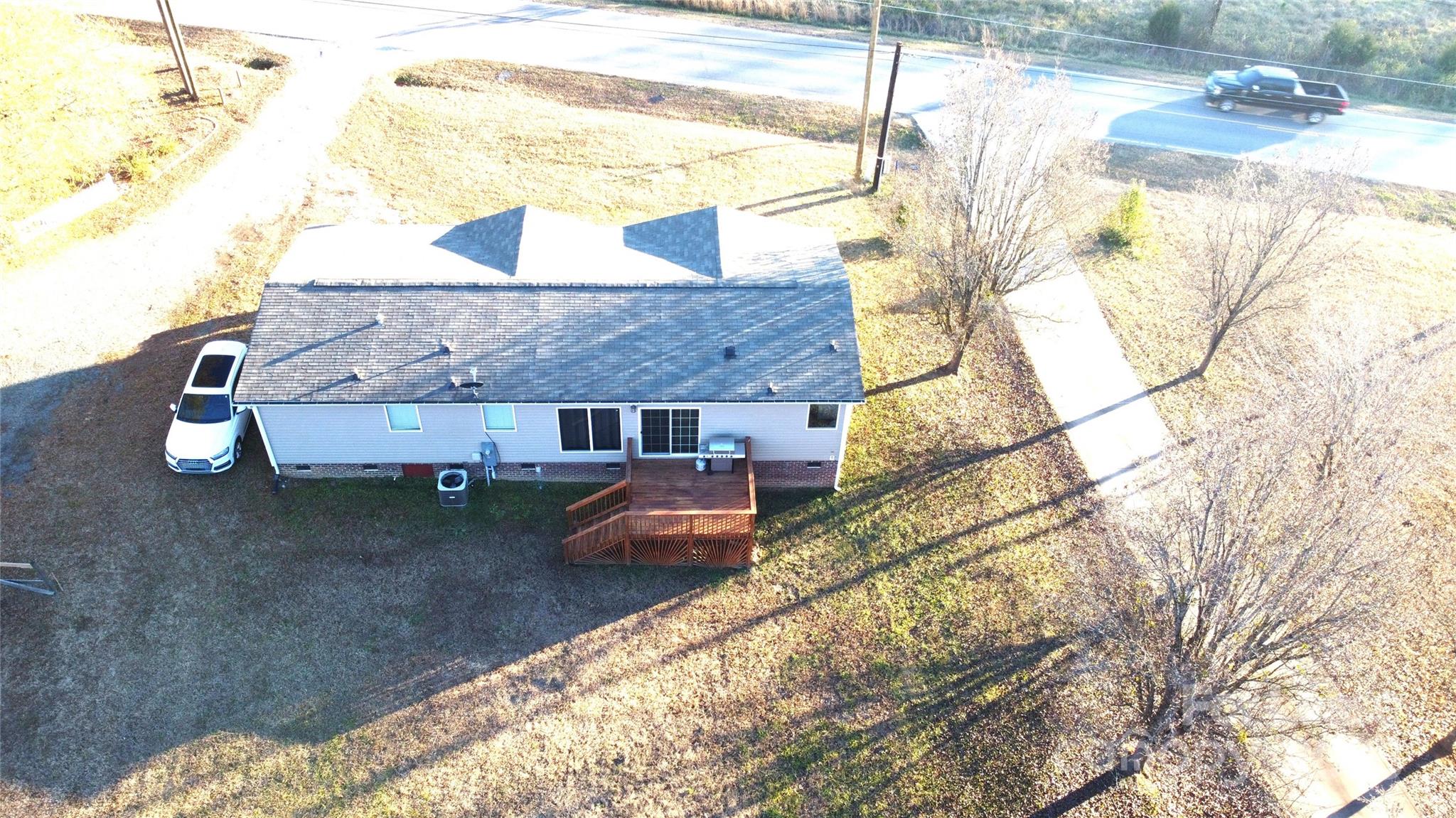 7708 Waxhaw Highway Waxhaw, NC 28173 - Photo 28 of 28 a view of house with a yard