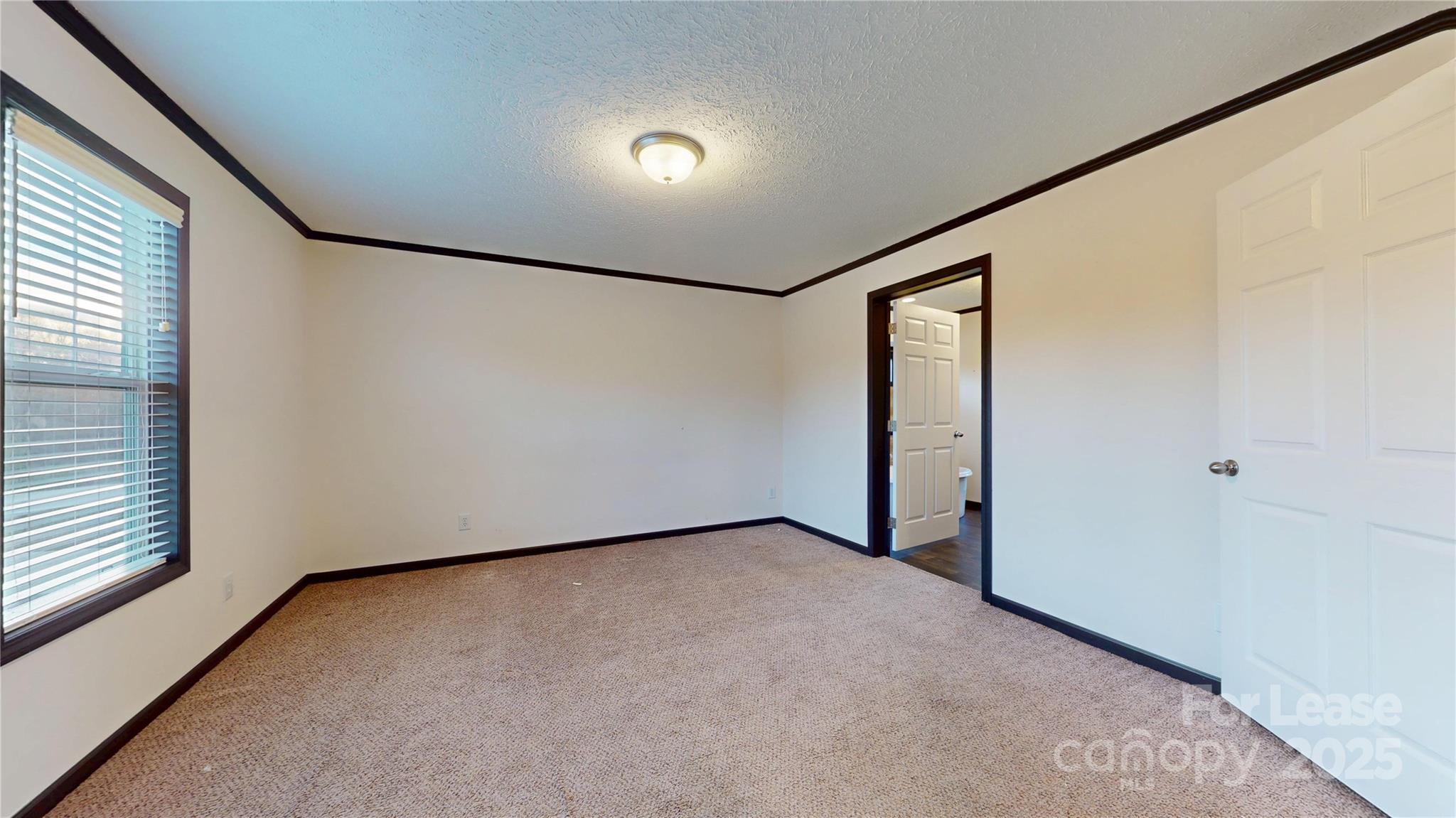 7708 Waxhaw Highway Waxhaw, NC 28173 - Photo 9 of 28 a view of a room with a large window