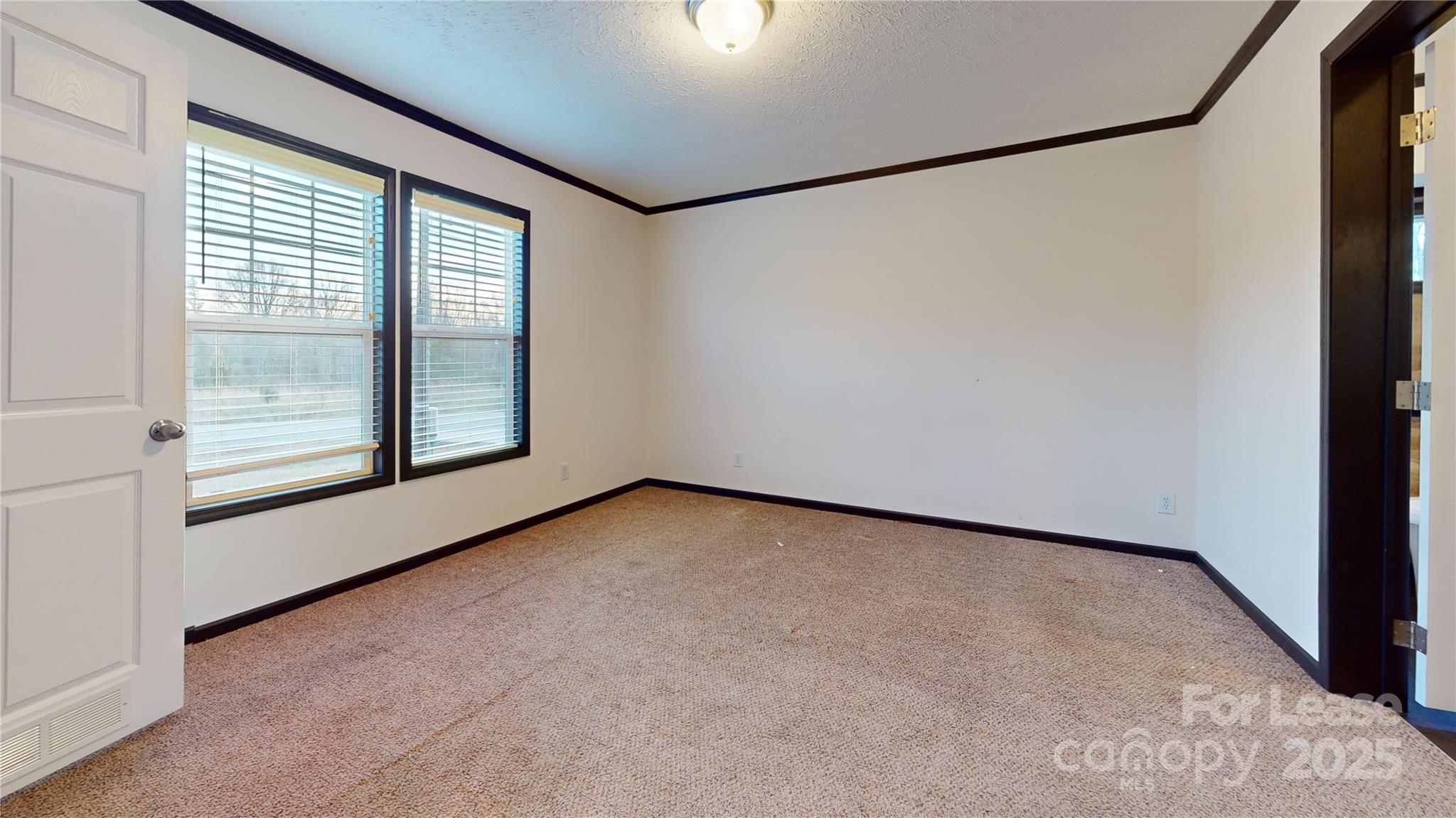 7708 Waxhaw Highway Waxhaw, NC 28173 - Photo 10 of 28 a view of an empty room with a window