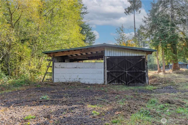 a view of outdoor space garage and basketball court