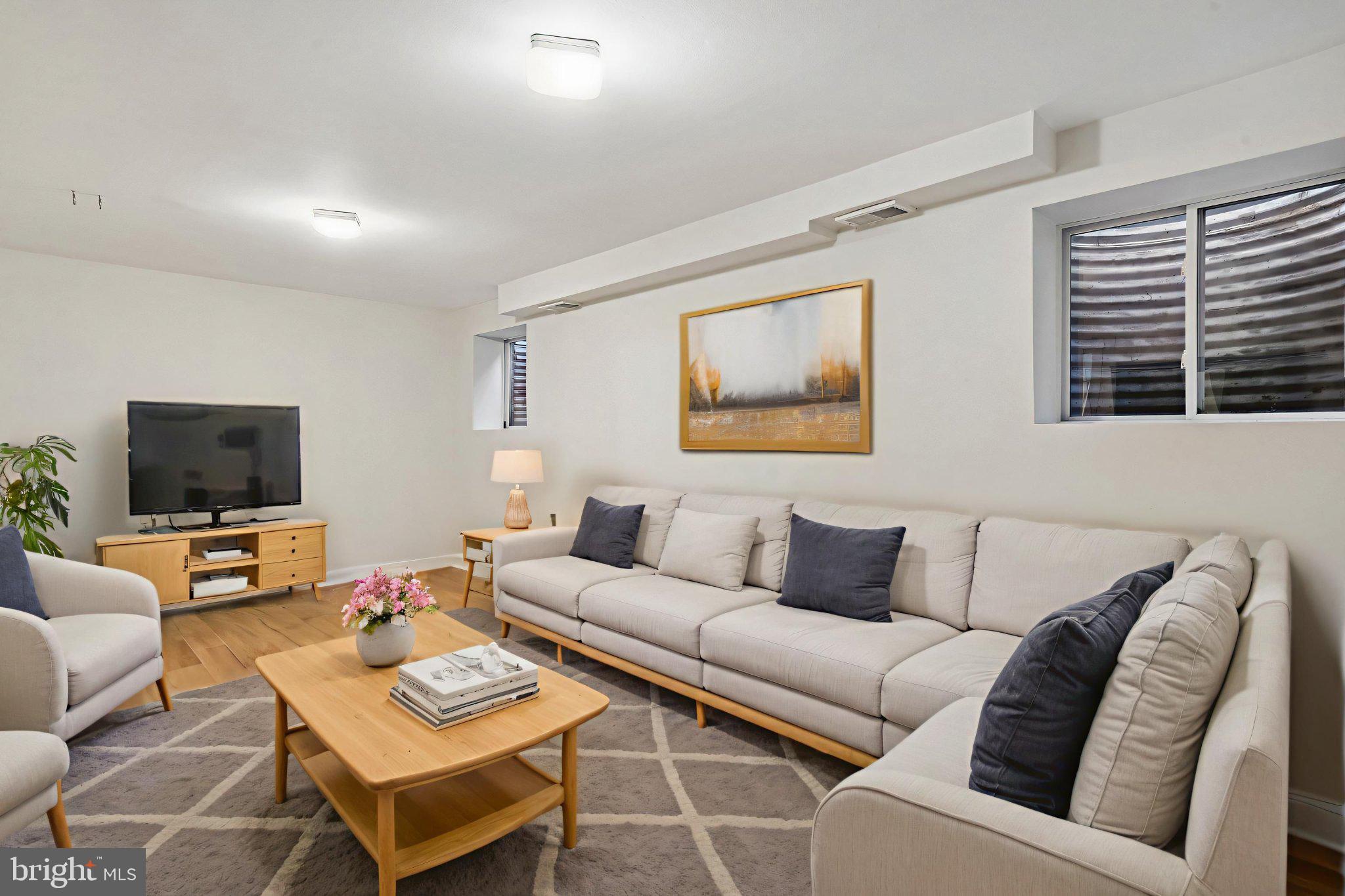 9211 Three Oaks Drive Silver Spring, MD 20901 - Photo 43 of 70 Modern living space with cozy charm.