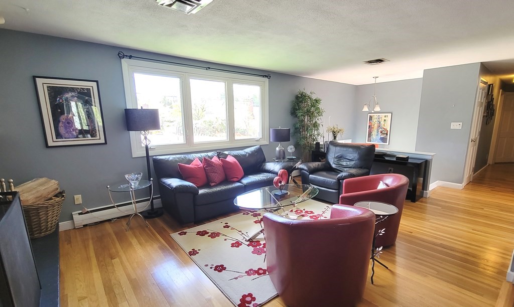 185 Evelyn Road Needham, MA 02494 - Photo 5 of 23 a living room with furniture and wooden floor