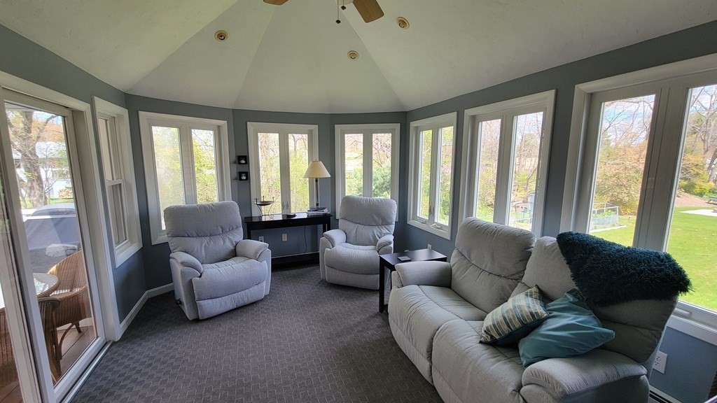 185 Evelyn Road Needham, MA 02494 - Photo 7 of 23 a living room with furniture and a large window