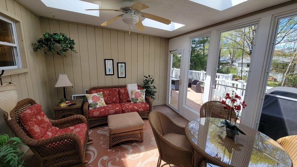 185 Evelyn Road Needham, MA 02494 - Photo 9 of 23 a living room with furniture flower pot and a large window