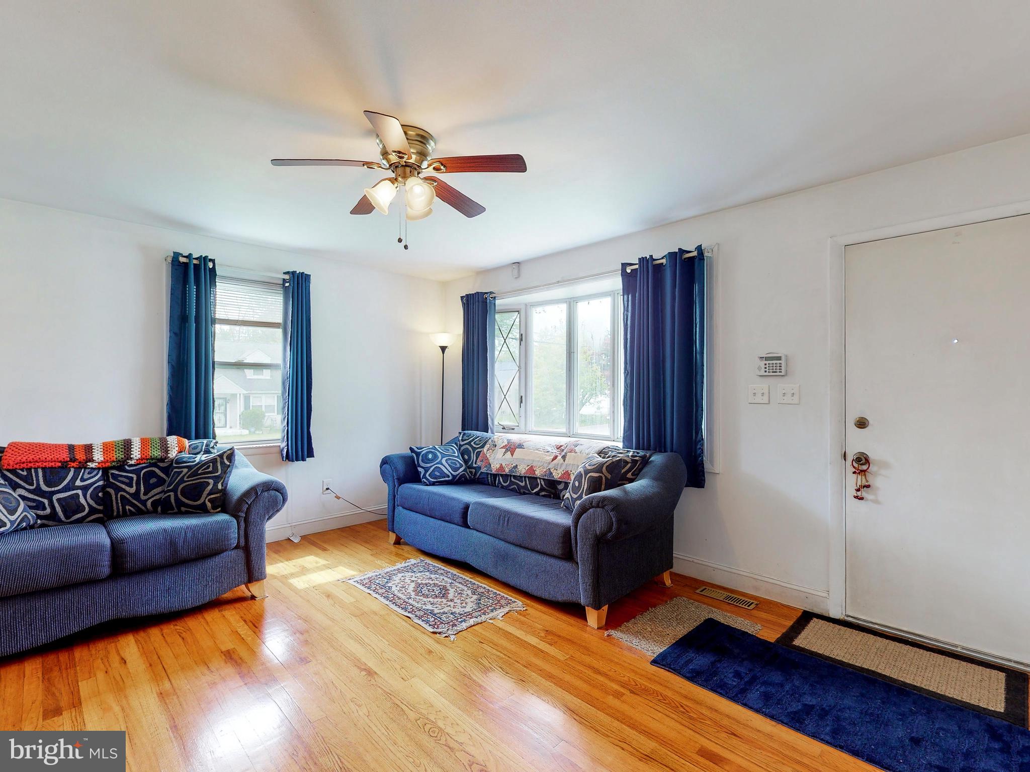3410 Offutt Road Randallstown, MD 21133 - Photo 4 of 35 Living Room w/ gleaming Hard Wood Floors