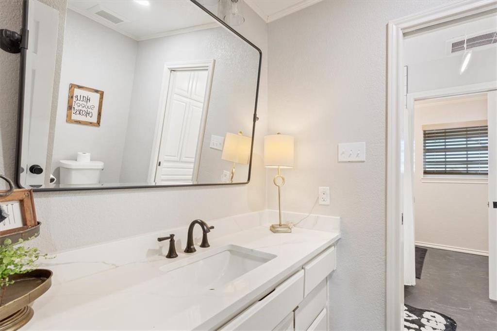 347 Howe Hill Road Lorena, TX 76655 - Photo 19 of 38 a bathroom with a sink and a mirror
