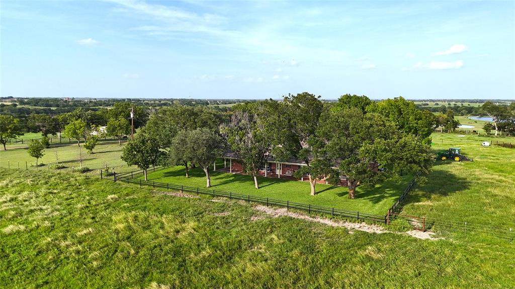 347 Howe Hill Road Lorena, TX 76655 - Photo 2 of 38 a view of a city with lush green forest