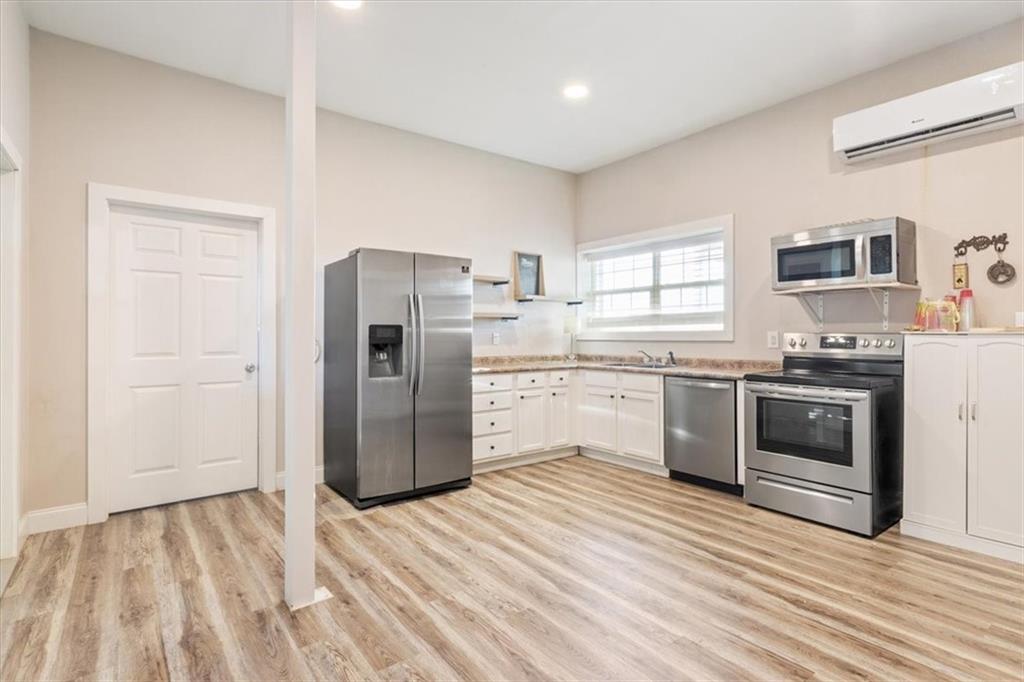 347 Howe Hill Road Lorena, TX 76655 - Photo 28 of 38 a kitchen with stainless steel appliances a refrigerator stove and sink