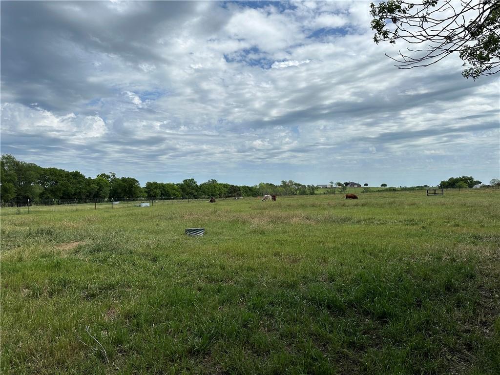 347 Howe Hill Road Lorena, TX 76655 - Photo 34 of 38 a view of a lake and green valley