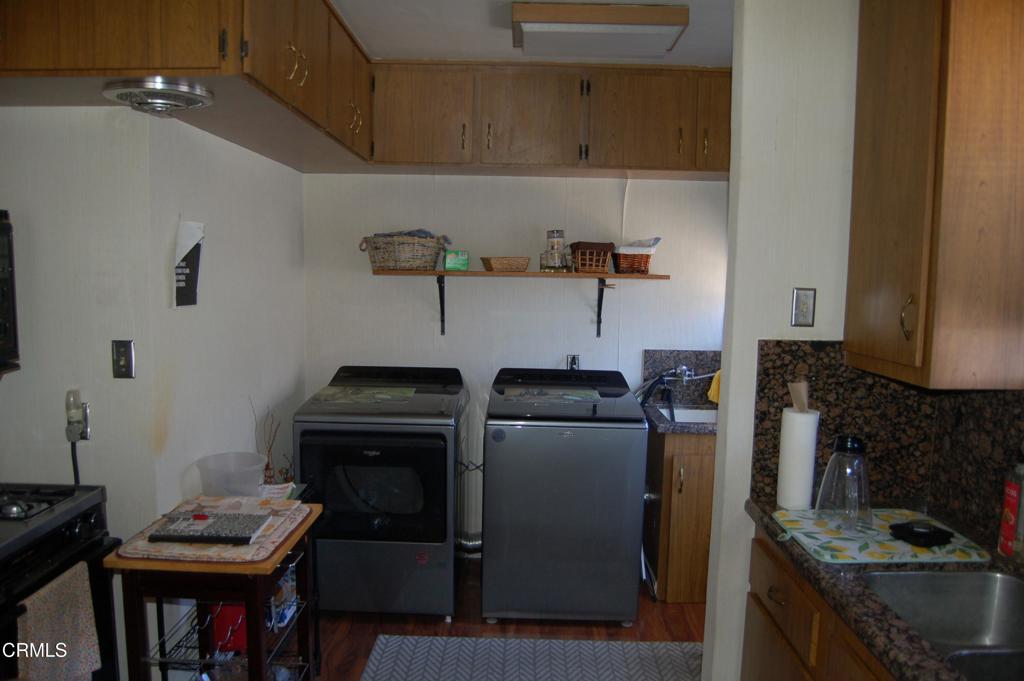 3912 Mohawk Street Pasadena, CA 91107 - Photo 10 of 24 a view of storage and utility room with washer and dryer