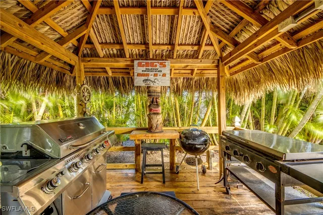 a view of an chairs and table in the patio