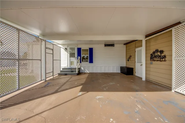 a view of a balcony with door