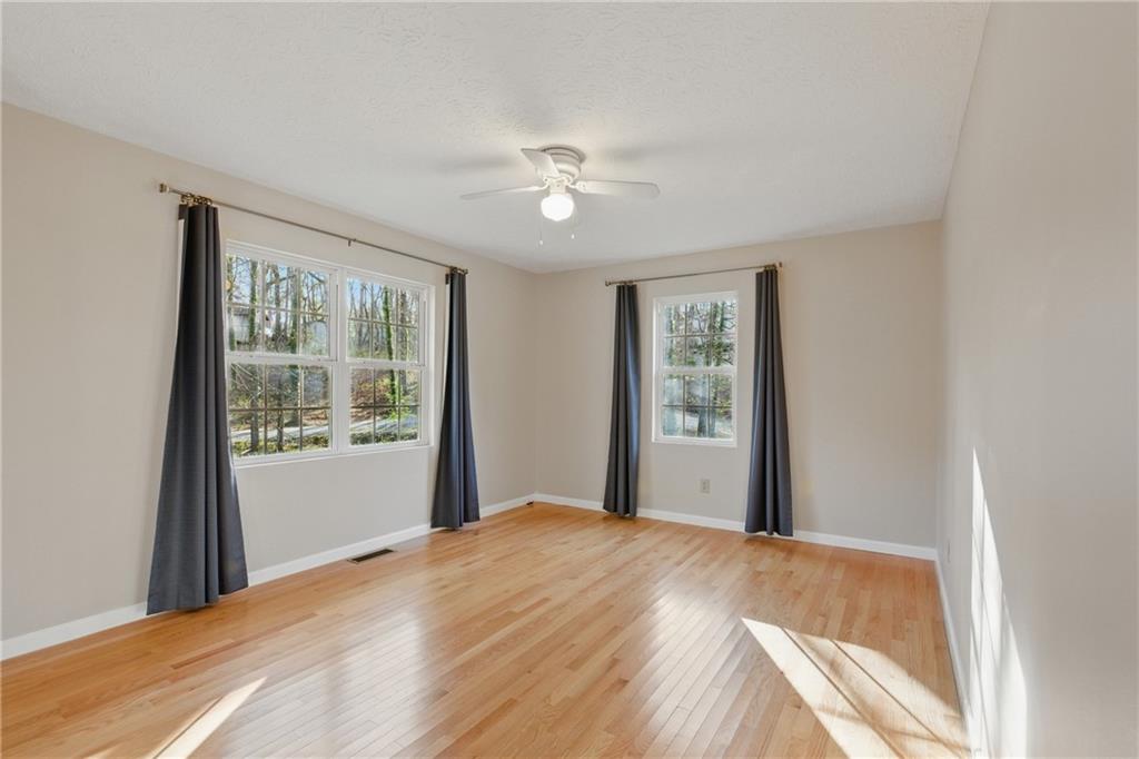 218 Eden Woods Clarkesville, GA 30523 - Photo 12 of 35 a bedroom with a bed and a window