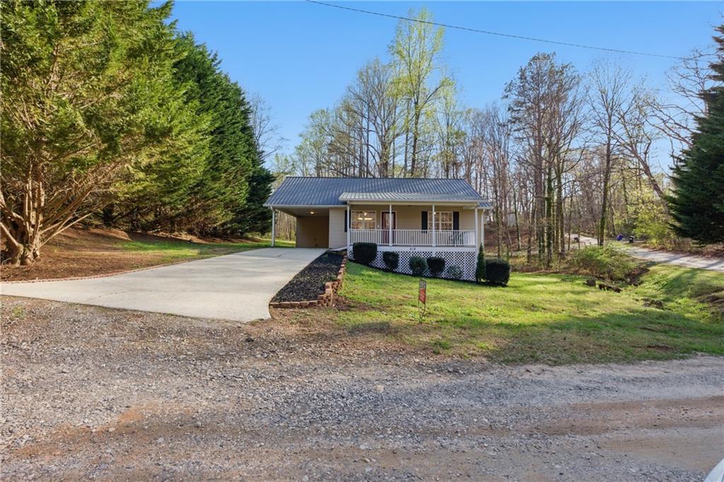 218 Eden Woods Clarkesville, GA 30523 - Photo 17 of 35 a view of a house with a yard