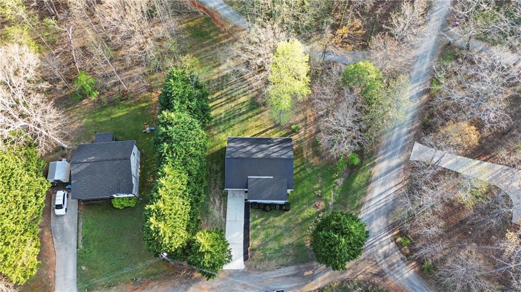 218 Eden Woods Clarkesville, GA 30523 - Photo 18 of 35 an aerial view of a house with a yard and large trees
