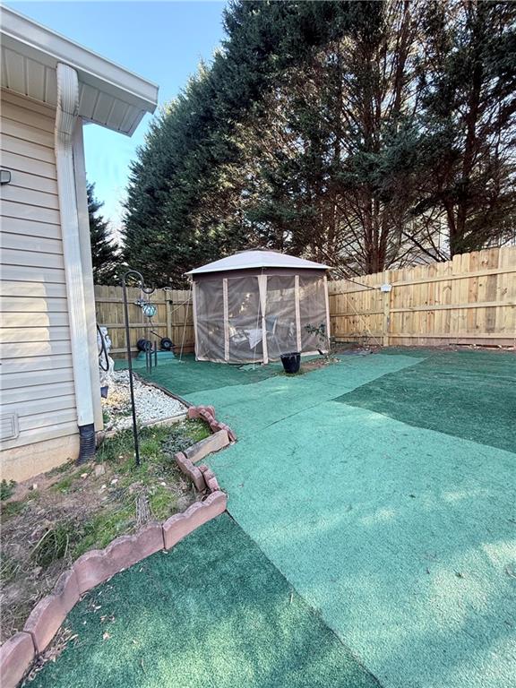 218 Eden Woods Clarkesville, GA 30523 - Photo 24 of 35 a view of a house with a yard and sitting area