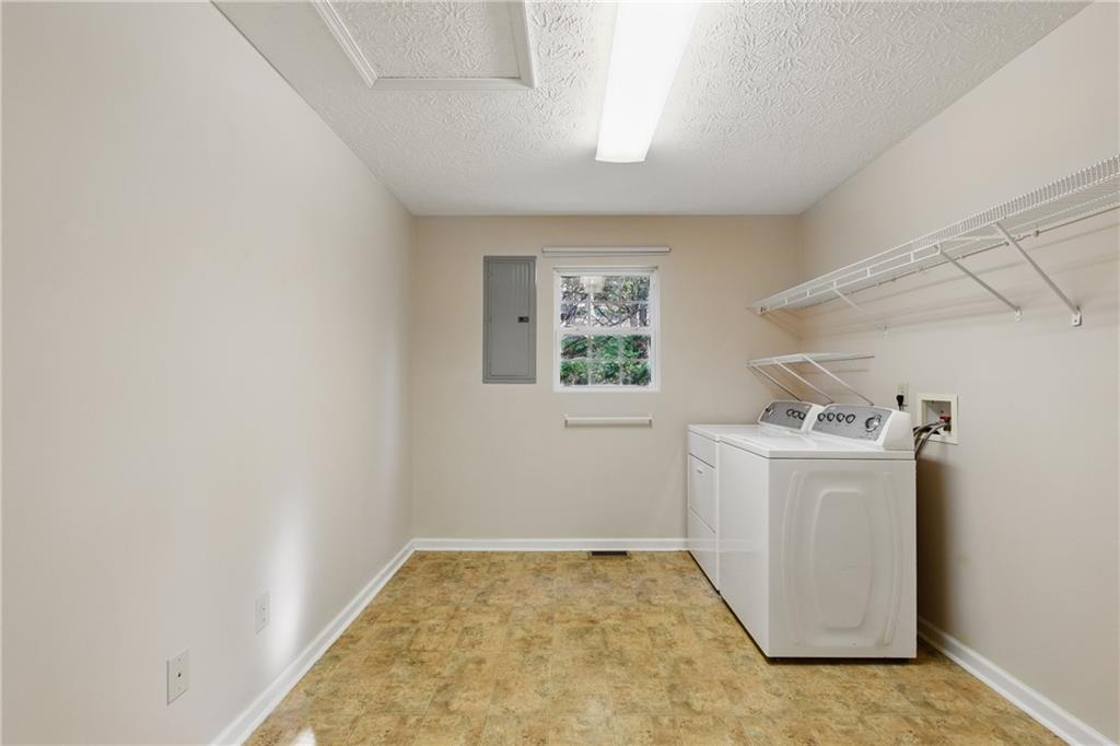 218 Eden Woods Clarkesville, GA 30523 - Photo 7 of 35 a view of utility room with washer and dryer