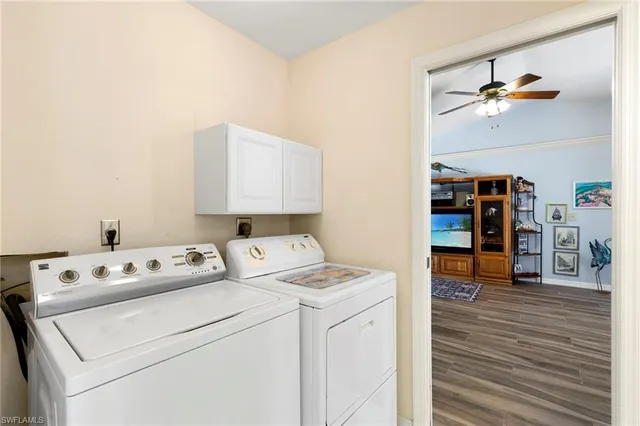 a storage room with washer and dryer
