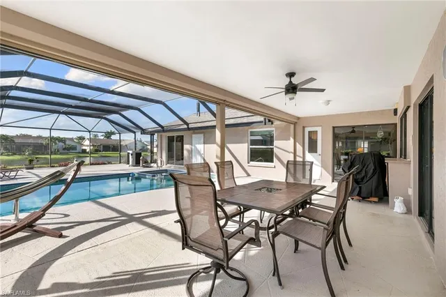 a view of a dining room with furniture and a table