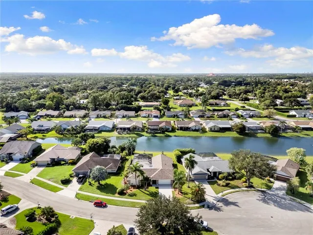 an aerial view of a houses with outdoor space