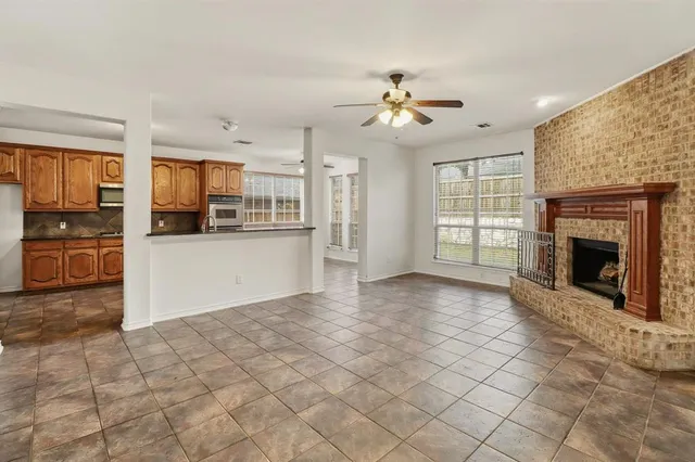 a view of a kitchen with a stove cabinets and a kitchen