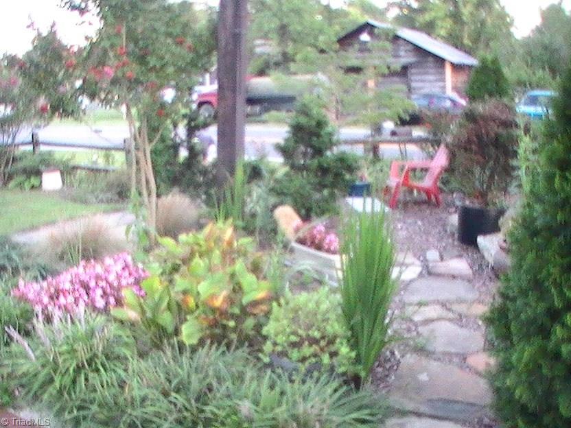 112 Main Church Road Mocksville, NC 27028 - Photo 7 of 26 Side view/flower garden